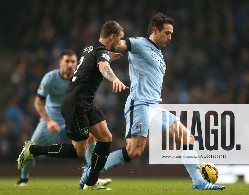 Frank Lampard of Manchester City held up by Kieran Trippier of Burnley - Barclays Premier League - Manchester City vs Burnley FC - Etihad Stadium - Manchester - England - 28th December 2014 - Picture Simon Bellis Sportimage .