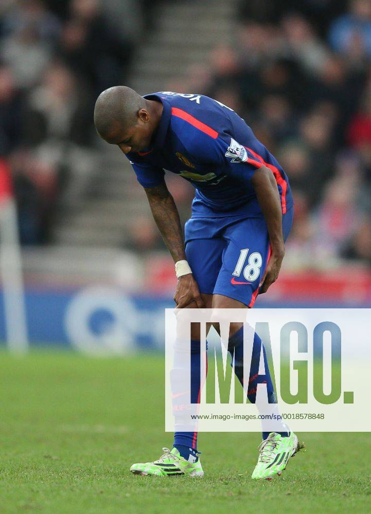 Ashley Young of Manchester United ManU pulls up and holds the back of his thigh - Barclays Premier League - Stoke City vs Manchester Utd - Stoke - England - 1st January 2015 - Picture Simon Bellis Sportimage .
