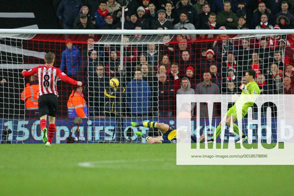 Football - 2014 2015 Premier League - Southampton vs. Arsenal Per Mertesacker of Arsenal fails to stop Southampton s Sadio Mane effort on goal to put Saints one nil up at St Mary s Stadium Southampton Colorsport Shaun Boggust