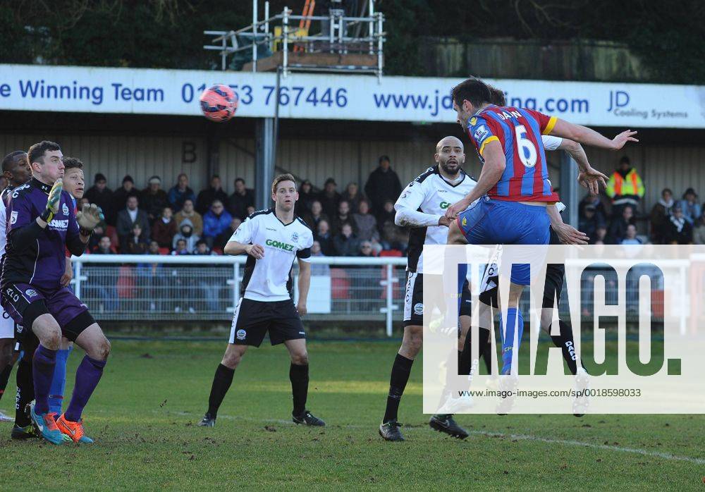 Football - 2014 2015 FA Cup - Third Round: Dover Athletic vs. Crystal Palace Palace s Scott Dann scores his 2nd goal pastAndrew Rafferty at the Crabble Athletic Ground. COLORSPORT ANDREW COWIE