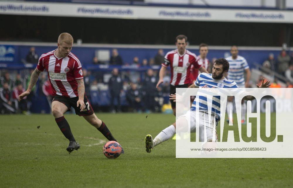 London, England. FA Cup 3rd Round. QPR versus Sheffield United. QPR s Charlie Austin slides in to win the ball against Sheffield United s Terry Kennedy. Cookex ActionPlus11586705