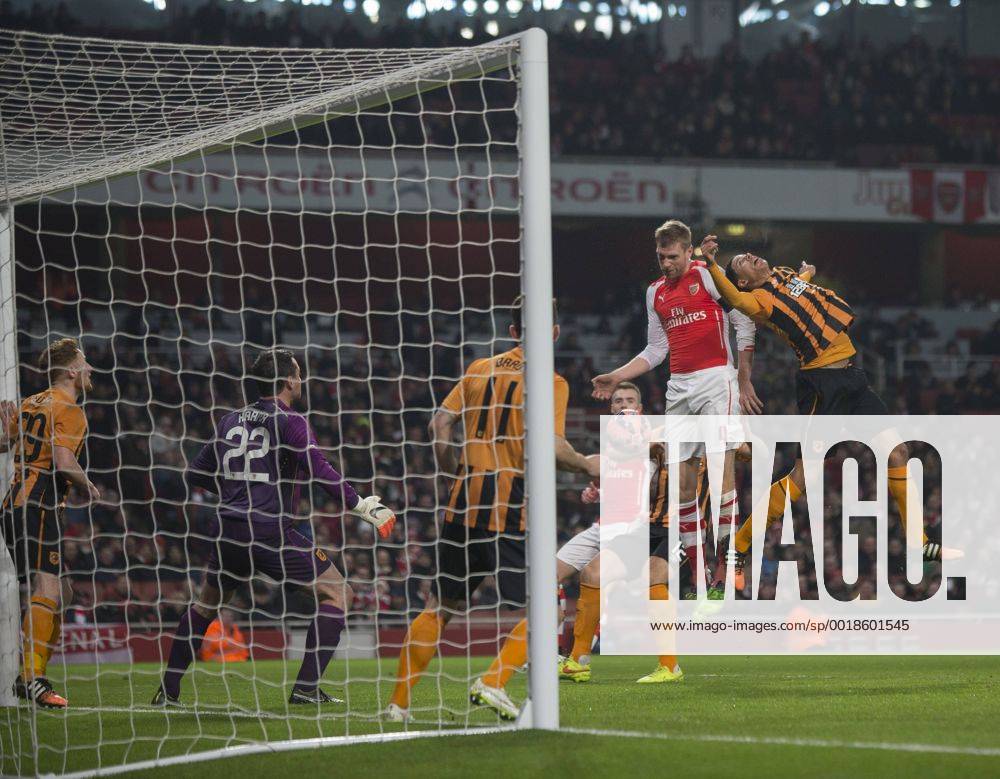 London, England. FA Cup 3rd Round. Arsenal versus Hull. Arsenal s Per Mertesacker scores the opening goal. Cookex ActionPlus11586941