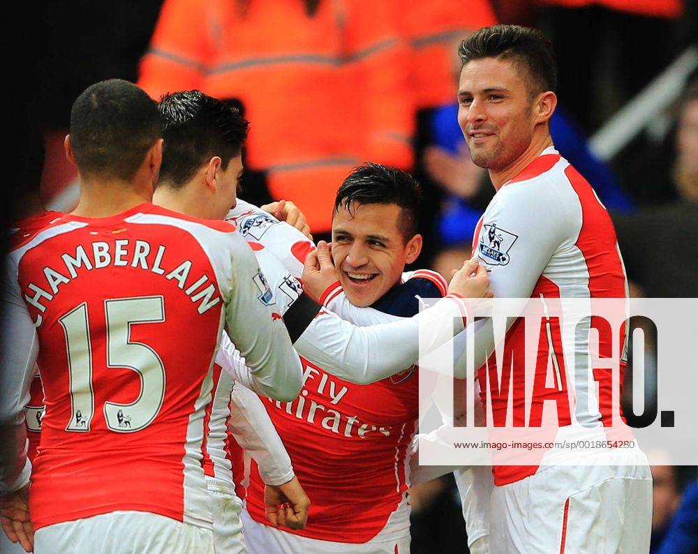Arsenal s Alexis Sanchez celebrates scoring his sides third goal Premier League - Arsenal vs Stoke City - Emirates Stadium - England - 11th January 2015 - Picture David Klein Sportimage .