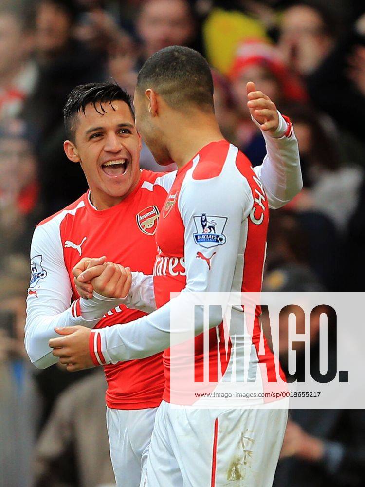 Arsenal s Alexis Sanchez celebrates scoring his sides third goal Premier League - Arsenal vs Stoke City - Emirates Stadium - England - 11th January 2015 - Picture David Klein Sportimage .