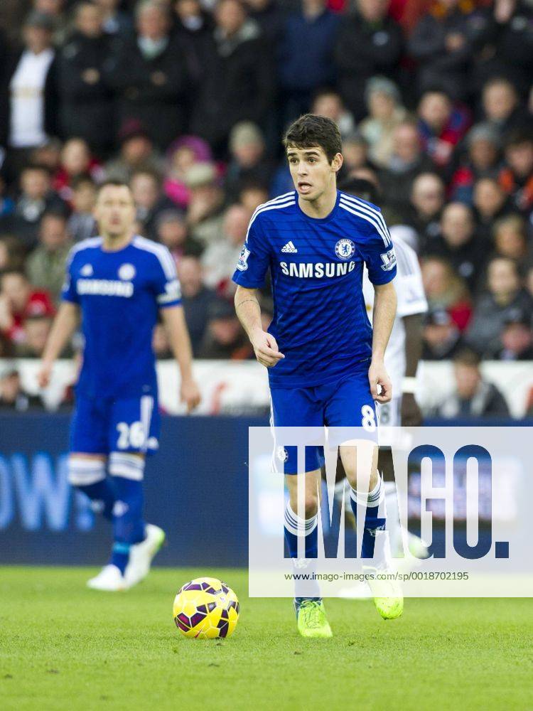 Football - 2014 2015 Premier League - Swansea City vs. Chelsea Oscar of Chelsea attacks at The Liberty Stadium. COLORSPORT WINSTON BYNORTH
