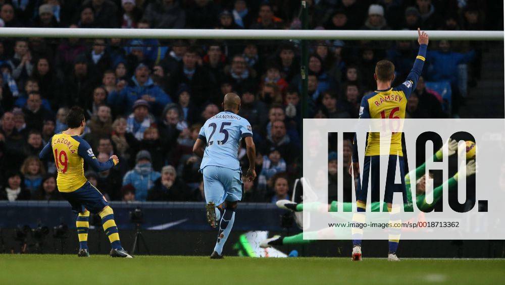 Santi Cazorla of Arsenal scores from the penalty spot past Joe Hart of Manchester City to go 0-1 up - Barclays Premier League - Manchester City vs Arsenal - Etihad Stadium - Manchester - England - 18th January 2015 - Picture Simon Bellis Sportimage .