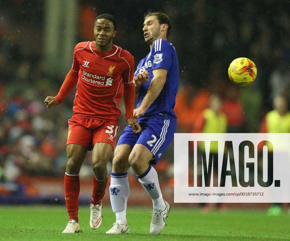 Raheem Sterling of Liverpool tussles with Branislav Ivanovic of Chelsea - Capital One Cup - Semi Final First Leg - Liverpool vs Chelsea - Anfield Stadium - Liverpool - England - 20th January 2015 - Picture Simon Bellis Sportimage .