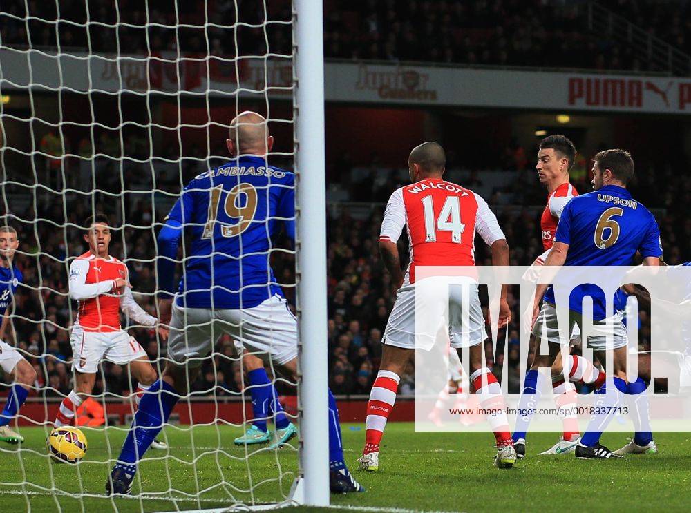 Arsenal s Laurent Koscielny scoring his sides opening goal Barclays Premier League- Arsenal vs Leicester City - Emirates Stadium - England - 10th February 2015 - Picture David Klein Sportimage .