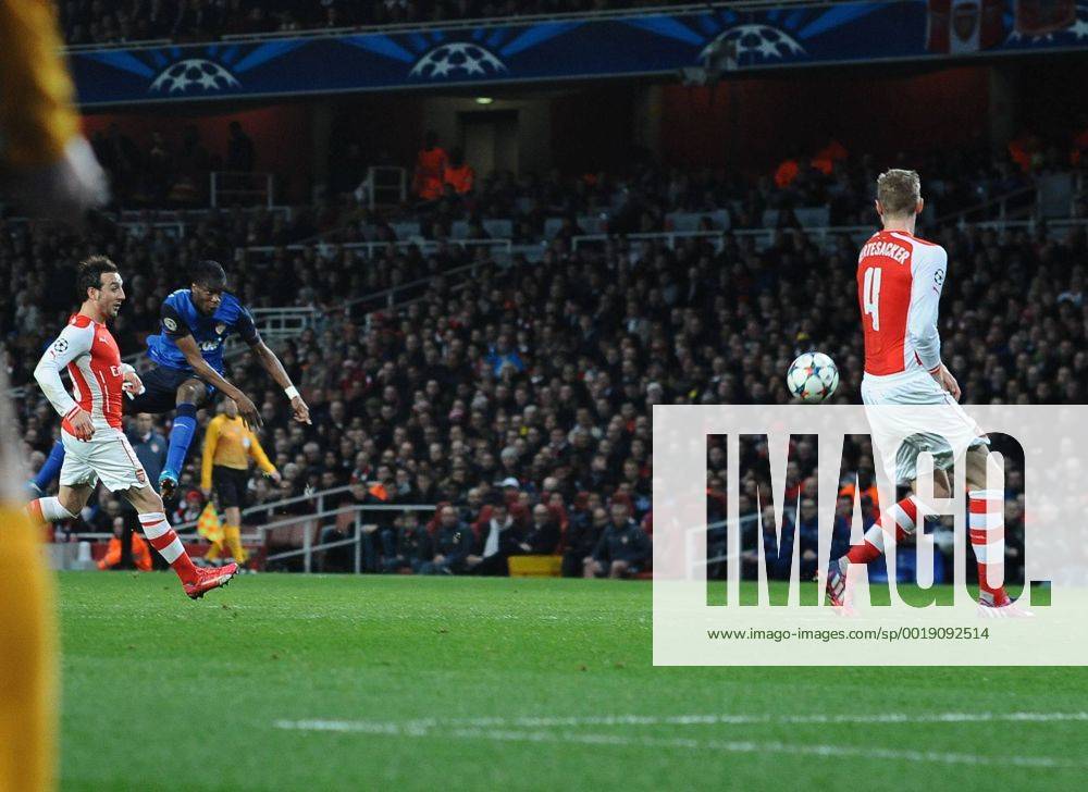 Football - 2014 2015 Champions League - Round of 16, First Leg: Arsenal vs. AS Monaco Geoffrey Kondogbia of Monaco scores his goal from a massive deflection off of Per Mertesacker at The Emirates. COLORSPORT ANDREW COWIE