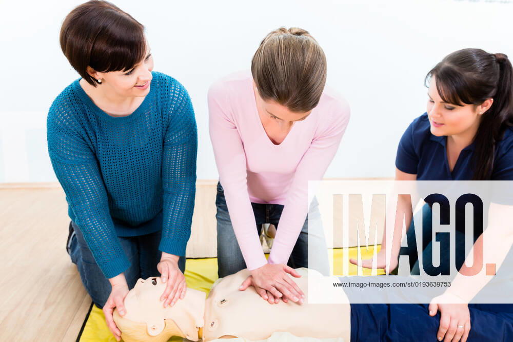 Group of women in first aid course exercising life-sustaining measures, model released, , 36350098.jpg, First Aid, woman, course, class, drivers licence, training, medicine, first aid course, revival, reanimation, first aider, administer, emergency, accident, lifesaving, measure, life support, life-sustaining measures, women, work, rescue service, survive, rescue, help, paramedic, doll, dummy, Rescusi-Anne, Rescue-Annie, CPR-Annie, Cardiac, heart, massage, circulation, asystolia, flatline, coronary, heart attack, stroke, cardiopulmonary resuscitation, Breathing, ventilation, mouth-to-mouth, mouth-to-nose, breath donation, rescue breathing, indoor, first-aid station, people, Caucasian