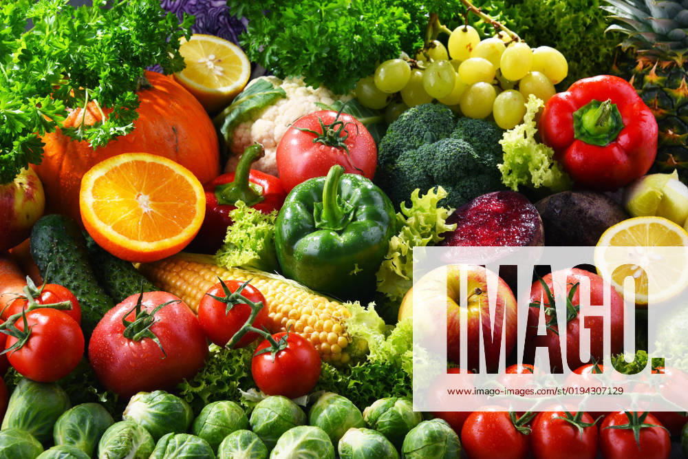 Composition with variety of fresh organic vegetables and fruits Composition with variety of fresh organic vegetables and fruits