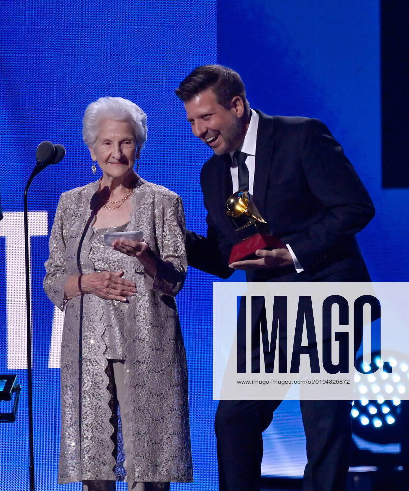 Angela Alvarez (L) accepts the Best New Artist award onstage during the 23rd annual Latin Grammy Awards at the Michelob Ultra Arena at Mandalay Bay Resort and Casino in Las Vegas, Nevada on Thursday, November 17, 2022. LAV20221117675 JIMxRUYMEN