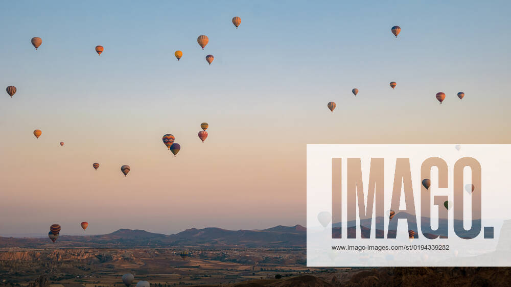 Turkey balloons Cappadocia Goreme Kapadokya , Sunrise in the mountains of Capadocia Background, Sunrise with hot air balloons in Cappadocia, Turkey balloons in Cappadocia Goreme Kapadokya, and Sunrise in the mountains of Cappadocia.