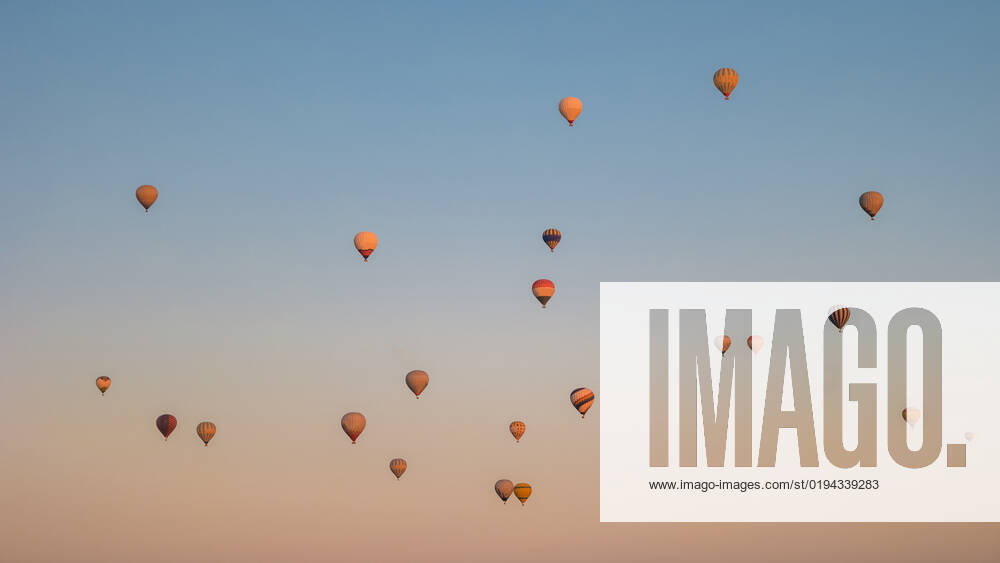 Turkey balloons Cappadocia Goreme Kapadokya , Sunrise in the mountains of Capadocia Background, Sunrise with hot air balloons in Cappadocia, Turkey balloons in Cappadocia Goreme Kapadokya, and Sunrise in the mountains of Cappadocia.