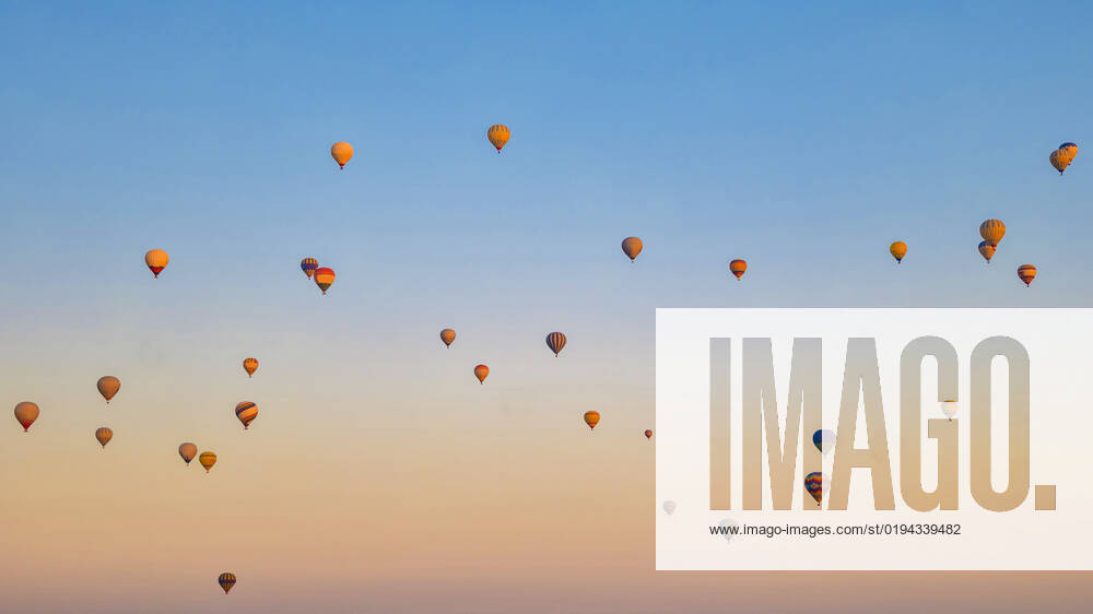 Turkey balloons Cappadocia Goreme Kapadokya , Sunrise in the mountains of Capadocia Background, Sunrise with hot air balloons in Cappadocia, Turkey balloons in Cappadocia Goreme Kapadokya, and Sunrise in the mountains of Cappadocia.