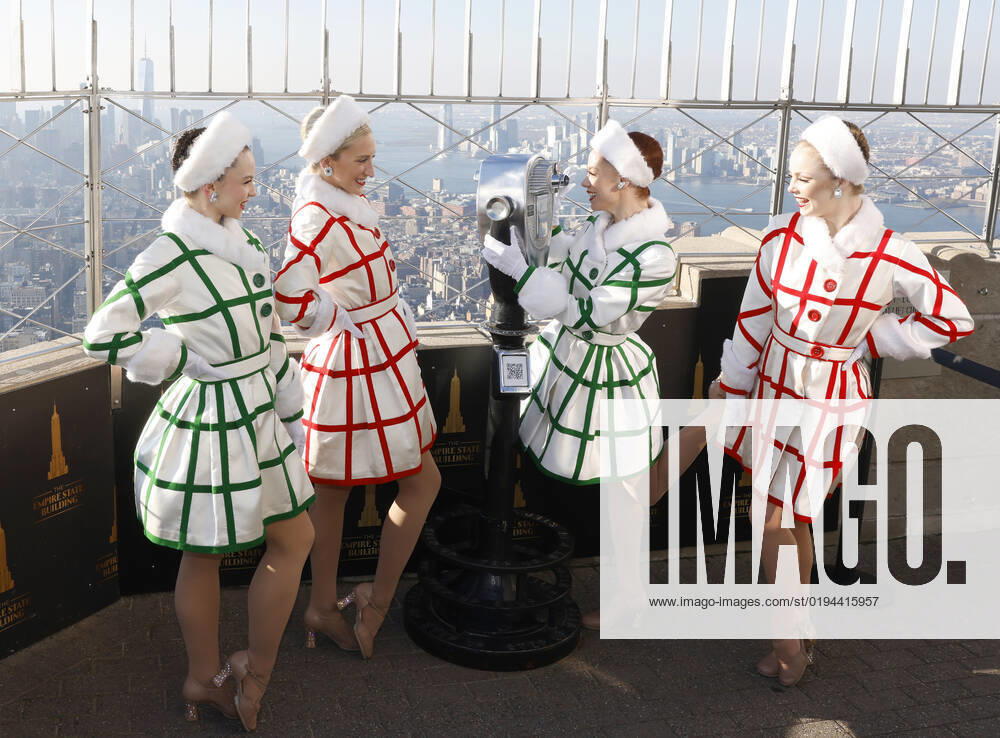 Radio City Rockettes dancers stand on the observation deck of the Empire State Building with a view of the Manhattan skyline in celebration of the opening of the 2022 Christmas Spectacular starring the Radio City Rockettes on Friday, November 18, 2022 in New York City. NYP20221118104 JOHNxANGELILLO