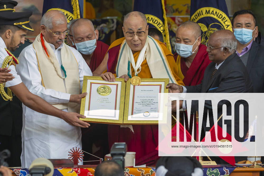 India: Tibetan Spiritual Leader the Dalai Lama receives Ghandhi Mandela Medal Tibetan Spiritual Leader the Dalai Lama being received the Ghandhi Mandela Award from Governors of Himachal Pradesh HE Rajendra Vishwanath Arlekar during The Ghandhi Mandela Award ceremony organised by Ghandhi Mandela Foundation, at Tsugla Khang Temple, Mcleodganj, Dharamshala on Saturday. HIMAACHAL PRADESH India