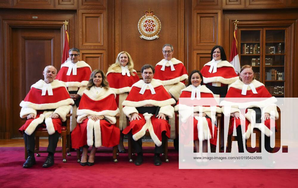Justice Michelle O Bonsawin, top right, takes part in a group photo with Judges Mahmud Jamal, back row left to right, Sheilah L. Martin, Nicholas Kasirer, and Russell Brown, bottom row left to right, Andromache Karakatsanis, Richard Wagner, Suzanne Cote, and Malcolm Rowe prior to her welcoming ceremony at the Supreme Court of Canada in Ottawa, on Monday, Nov. 28, 2022. O Bonsawin is the first Indigenous judge to be appointed to the Supreme Court of Canada. Ottawa Canada - ZUMAc35_ 20221128_zaf_c35_076