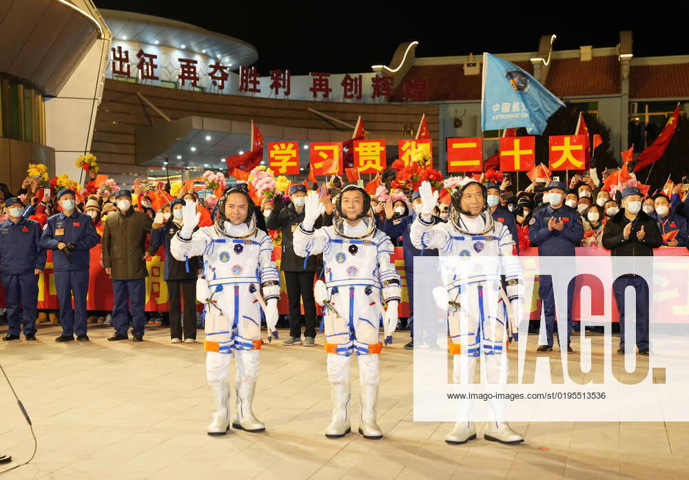 (221129) -- JIUQUAN, Nov. 29, 2022 -- A see-off ceremony for three Chinese astronauts of the Shenzhou-15 manned space mission is held at the Jiuquan Satellite Launch Center in northwest China, Nov. 29, 2022. Astronauts Fei Junlong (R), Deng Qingming (C), and Zhang Lu have received years of arduous training for this six-month mission, during which the construction of China s space station will be officially completed. ) CHINA-JIUQUAN-SHENZHOU-15-ASTRONAUTS-SEE-OFF CEREMONY (CN) LixGang