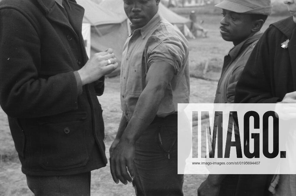 Vaccination in the camp for Negro flood refugees at Marianna, Arkansas, 1937. Creator: Walker Evans.