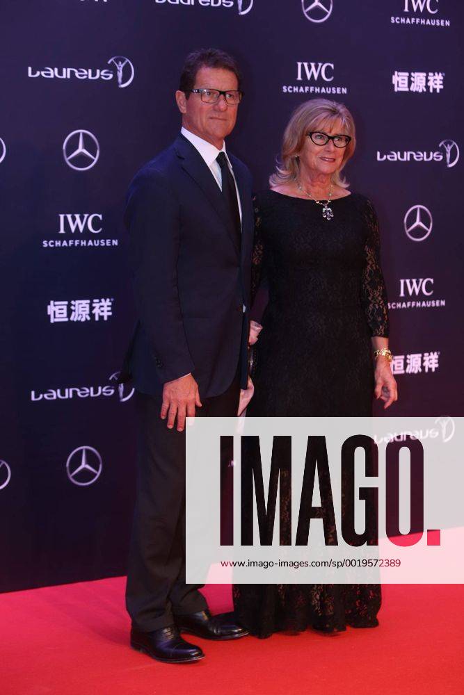 Fabio Capello, left, head coach of the Russia national football team, poses with wife Laura on the red carpet for the Laureus World Sports Awards Shanghai 2015 in Shanghai, China, 15 April 2015. Stars glam up red carpet for Laureus World Sports Awards Shanghai 2015 20150415_63428
