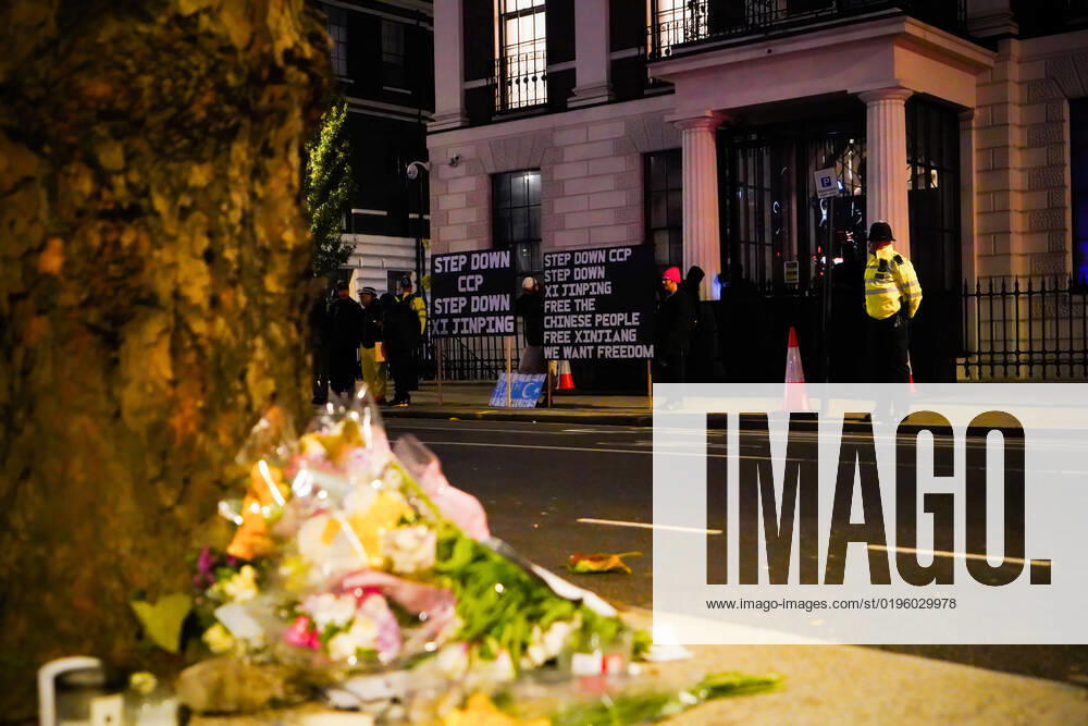 Flowers are laid outside the Chinese Embassy to pay tribute to the lives lost during the Urumqi fire. Dozens of protesters gather outside the Chinese Embassy in London, the United Kingdom, to demand greater political freedoms in China. The outpouring of nationwide Chinese protests were sparked by a deadly fire in Urumqi on November 24, 2022 where 10 people were reported to be killed because of strict Covid lockdowns. London United Kingdom - ZUMAs197 20221205_zaa_s197_005