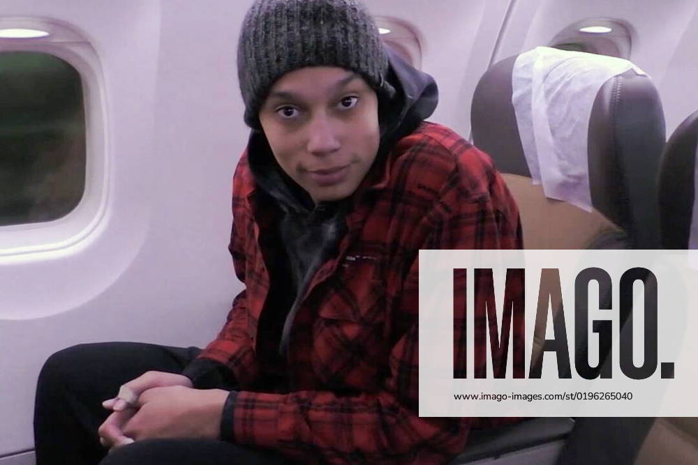 UNITED ARAB EMIRATES, ABU DHABI - DECEMBER 8, 2022: US basketball player Brittney Griner is seen on a plane ahead of departing for the United States. Griner, sentenced to 9 years in a Russian penal colony for drug smuggling, was freed in a prisoner exchange for Russian citizen Viktor Bout, sentenced to 25 years in a US prison for conspiring to kill US citizens and officials. Video grab. Best quality available. FSB TASS 56325447