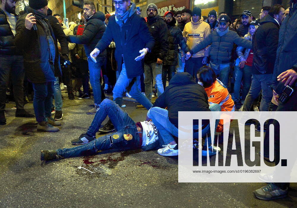 Milan - Stabbing occurred near Corso Buenos Aires during the celebrations of Morocco fans for their victory in the World Cup (in the photo, a man on the ground bleeding after the stabbing) Editorial Usage Only