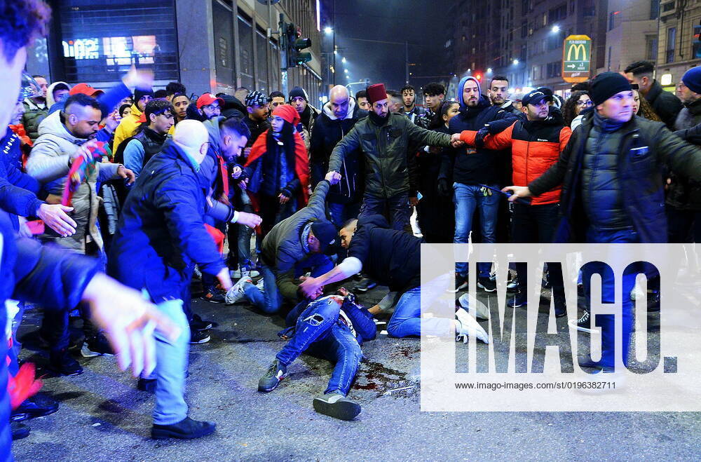 Milan - Stabbing occurred near Corso Buenos Aires during the celebrations of Morocco fans for their victory in the World Cup (in the photo, a man on the ground bleeding after the stabbing) Editorial Usage Only