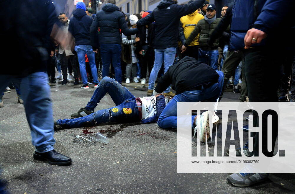 Milan - Stabbing occurred near Corso Buenos Aires during the celebrations of Morocco fans for their victory in the World Cup (in the photo, a man on the ground bleeding after the stabbing) Editorial Usage Only