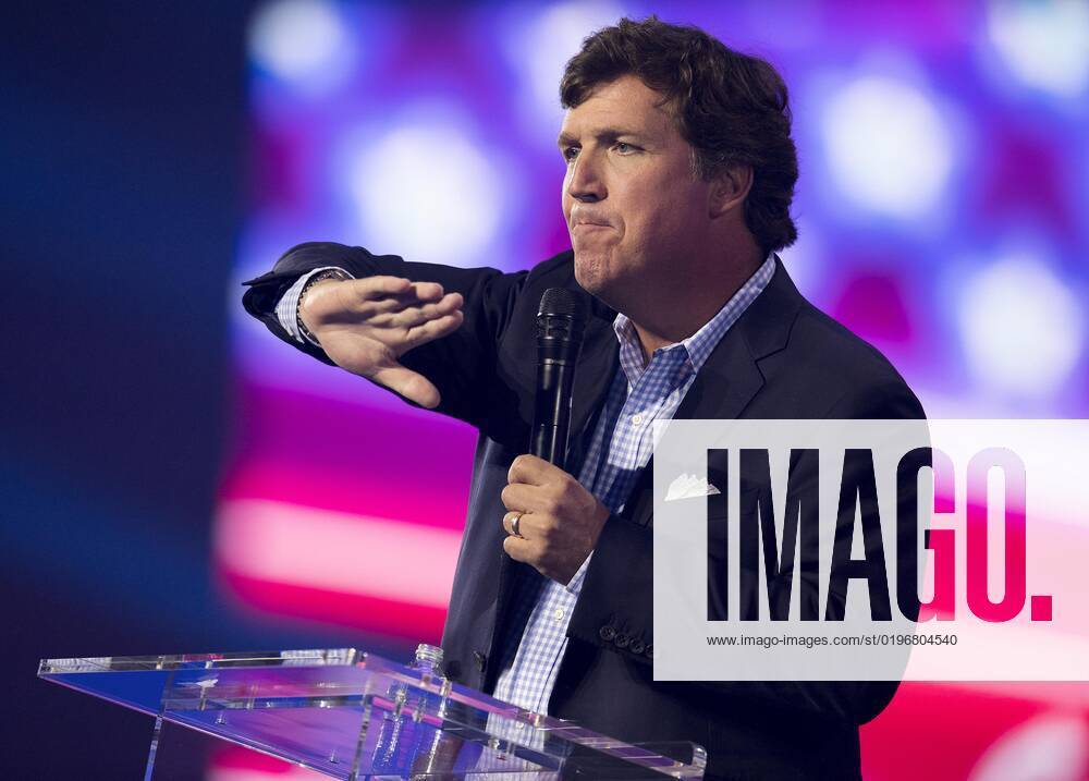 Phoenix, Arizona, USA - Fox News host TUCKER CARLSON speaks at Turning Point USA s AmericaFest 2022. Phoenix USA - ZUMAce6_ 20221217_zaf_ce6_001