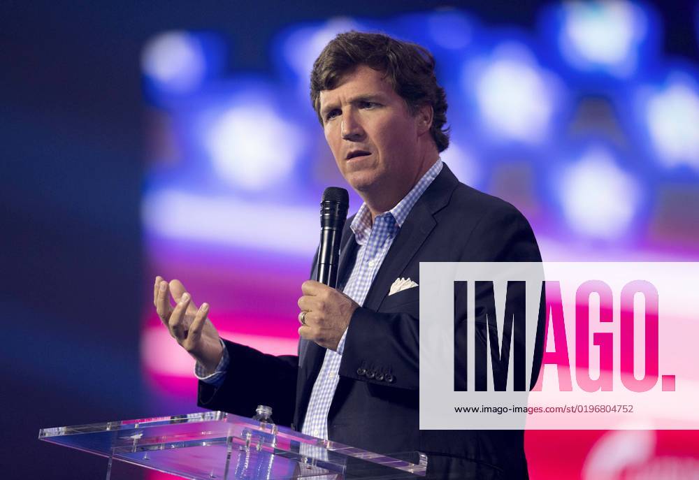 Phoenix, Arizona, USA - Fox News host TUCKER CARLSON speaks at Turning Point USA s AmericaFest 2022. Phoenix USA - ZUMAce6_ 20221217_zaf_ce6_012