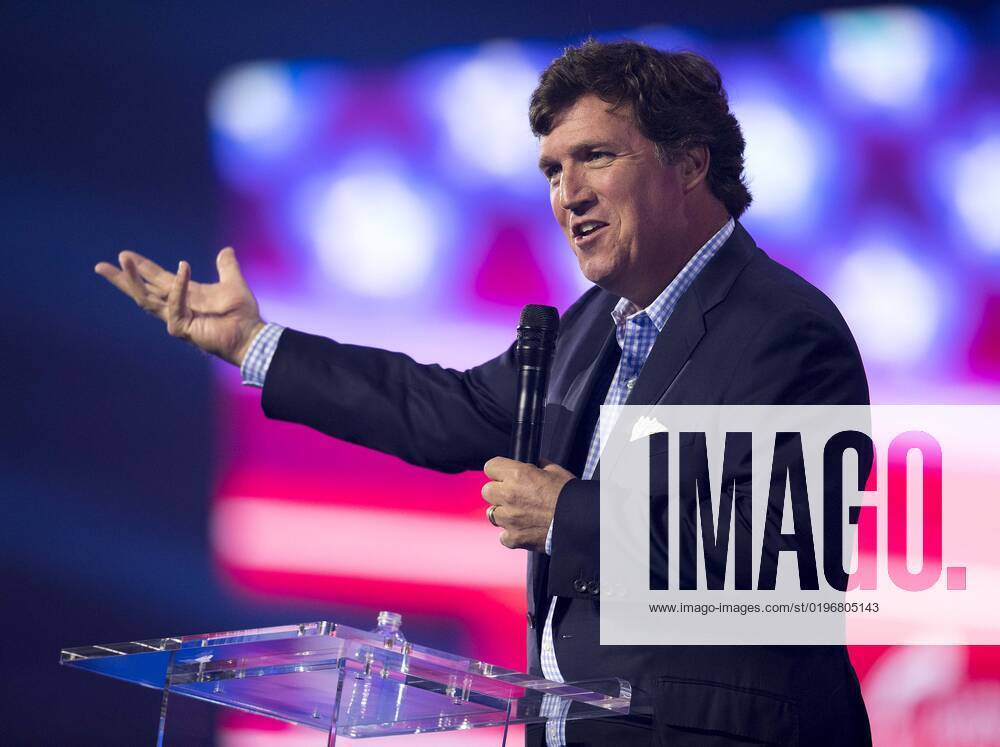 Phoenix, Arizona, USA - Fox News host TUCKER CARLSON speaks at Turning Point USA s AmericaFest 2022. Phoenix USA - ZUMAce6_ 20221217_zaf_ce6_019