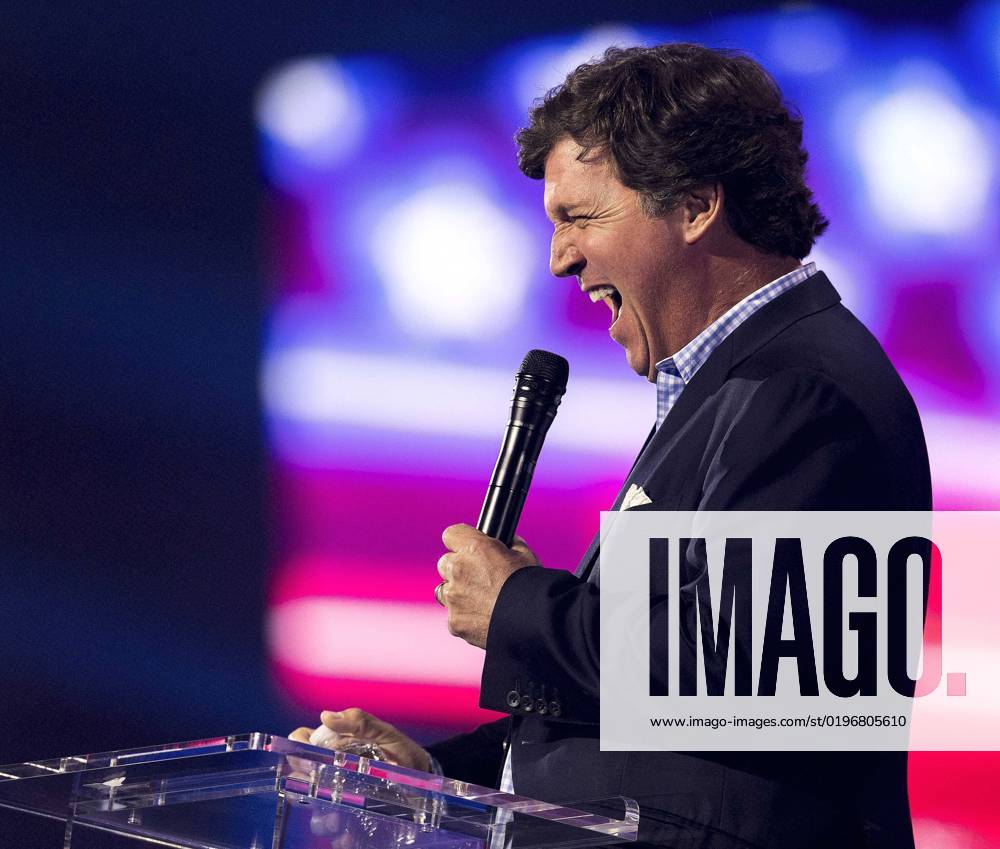 Phoenix, Arizona, USA - Fox News host TUCKER CARLSON speaks at Turning Point USA s AmericaFest 2022. Phoenix USA - ZUMAce6_ 20221217_zaf_ce6_021