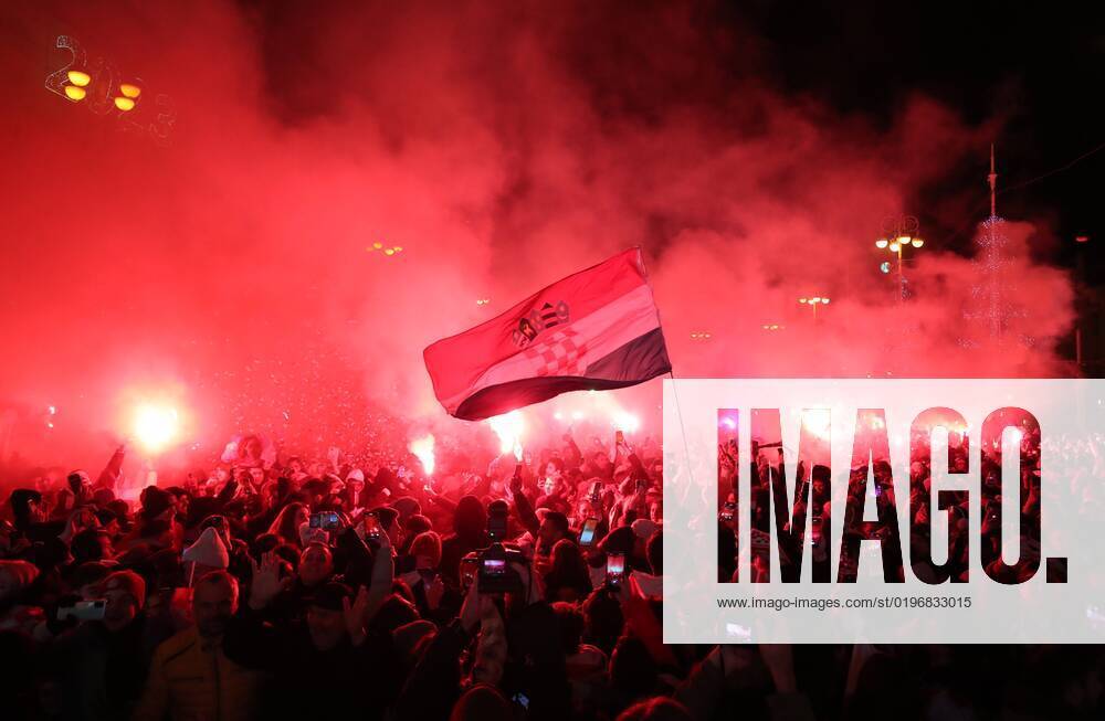 (221218) -- ZAGREB, Dec. 18, 2022 -- Croatian football fans celebrate at Ban Jelacic Square in Zagreb, Croatia, Dec. 17, 2022. Croatia beat Marocco and won the third place at the Qatar World Cup on Saturday. ( PIXSELL via Xinhua) (SP)CROATIA-ZAGREB-FOOTBALL-FIFA WORLD CUP-FANS SanjinxStrukic