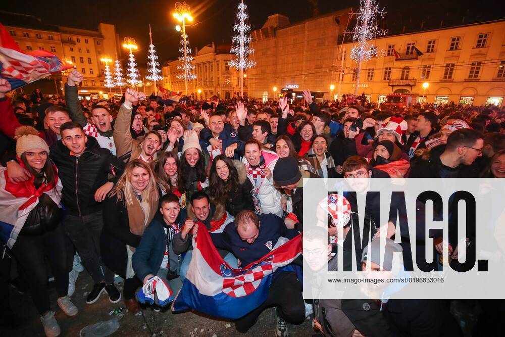 (221218) -- ZAGREB, Dec. 18, 2022 -- Croatian football fans celebrate at Ban Jelacic Square in Zagreb, Croatia, Dec. 17, 2022. Croatia beat Marocco and won the third place at the Qatar World Cup on Saturday. ( PIXSELL via Xinhua) (SP)CROATIA-ZAGREB-FOOTBALL-FIFA WORLD CUP-FANS SanjinxStrukic