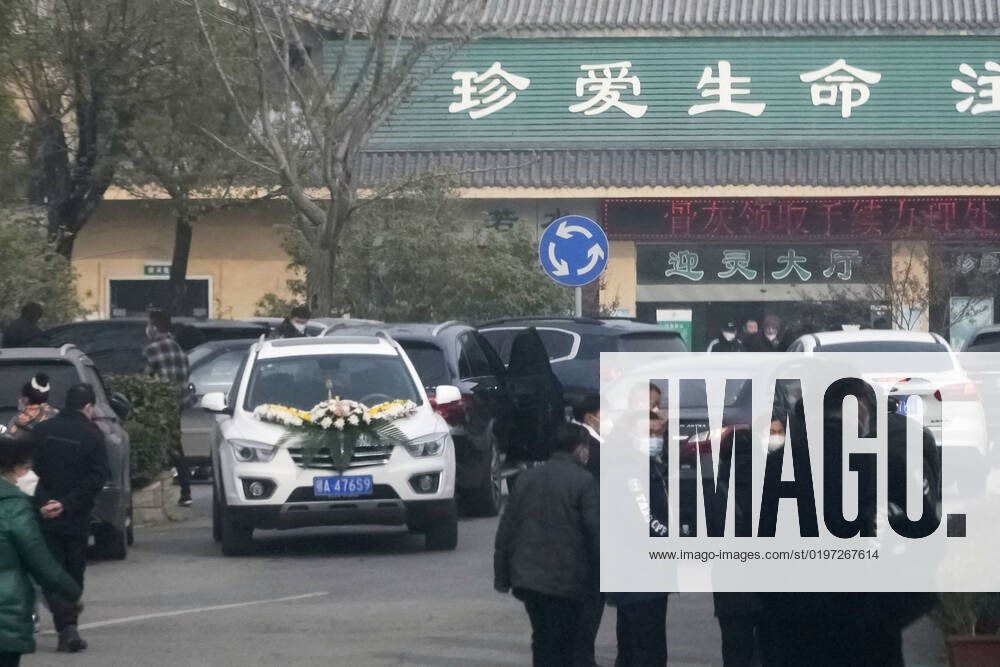 Wuhan amid COVID surge A funeral hall in Wuhan is crowded with cars and people on Dec. 29, 2022, amid a surge in COVID-19 cases. The Chinese government eased its strict antivirus measures earlier in the month. A14AA0001380146P