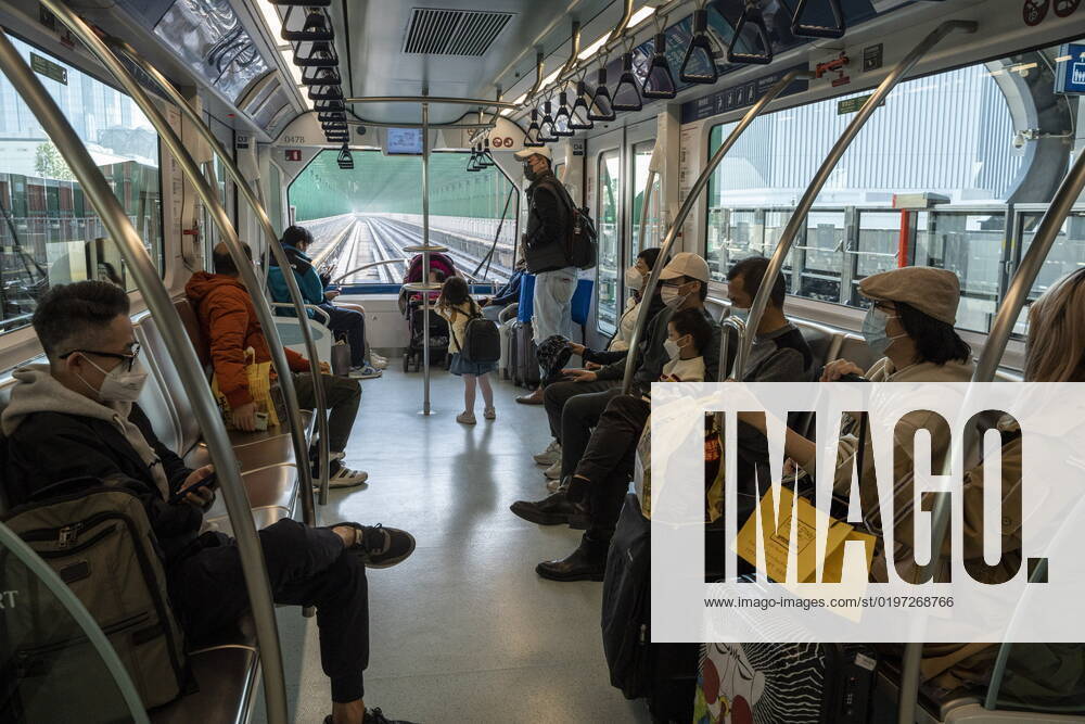 Daily Life In Macau Commuters wearing face masks riding on the Macao Light Rapid Transit on December 29, 2022 in Macau, China. Macau Macau