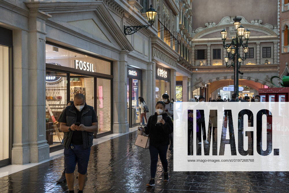Daily Life In Macau Shoppers wearing face masks inside The Grand Canal Shoppes on December 29, 2022 in Macau, China. Macau Macau