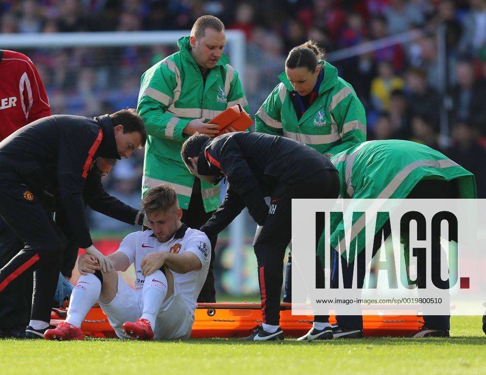 London, England. Barclays Premier League. Crystal Palace versus Manchester United ManU Luke Shaw is inured and taken off by the medical staff Hearnx ActionPlus11619402