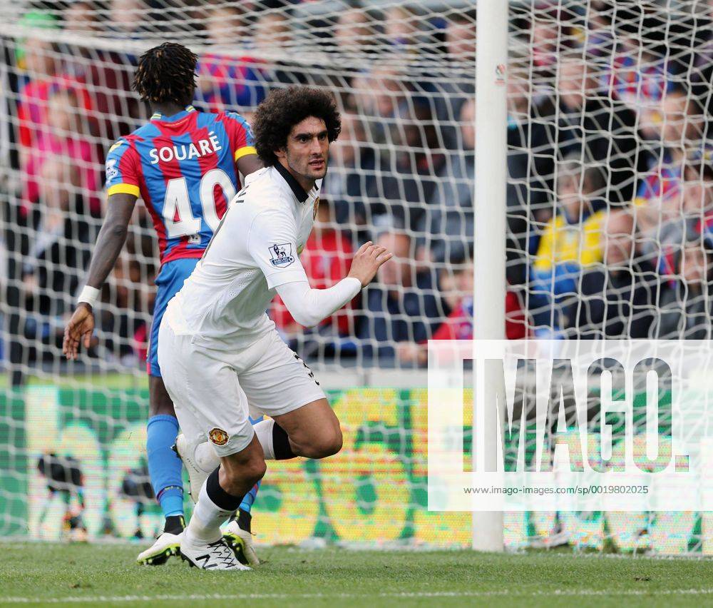 Manchester United ManU s Marouane Fellaini celebrates scoring his sides second goal as fans invade the pitch Barclays Premier League - Crystal Palace vs Manchester United- Selhurst Park - England - 9th May 2015 - Picture David Klein Sportimage .