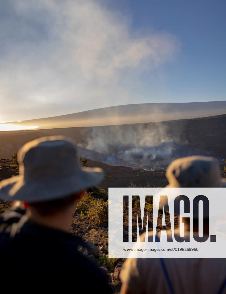 VOLCANO, HI - January 7, 2023: Spectators observe the eruption pictured as Hawaii?s Kilauea volcano eruption continued after re-erupting on January 5th in Volcano, HI on January 7, 2023.