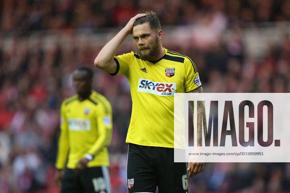 Harlee Dean of Brentford looks dejected - Middlesbrough vs. Brentford - Skybet Championship - Play Off Second Leg - Riverside Stadium - Middlesbrough - 15 05 2015 Pic Philip Oldham Sportimage .