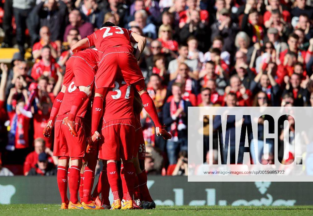 Adam Lallana of Liverpool is mobbed after scoring the first goal - Barclays Premier League - Liverpool vs Crystal Palace - Anfield Stadium - Liverpool - England - 16th May 2015 - Picture Simon Bellis Sportimage .