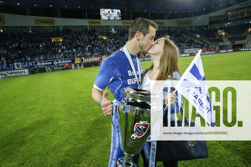 - GENT, BELGIUM: Gent s Brecht Dejaegere holds the trophy after winning the Jupiler Pro League match between KAA Gent and Standard de Liege, Thursday 21 May 2015 in Gent, on the ninth day of the Play-off 1. THIERRYxROGE x04628026x