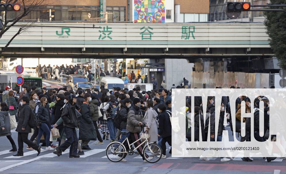 Tokyo scene amid coronavirus pandemic People wear face masks outdoors near Tokyo s Shibuya station on Jan. 20, 2023. Japanese Prime Minister Fumio Kishida announced same day plans to downgrade the legal status of COVID-19 to the equivalent of seasonal influenza in the spring. A14AA0001386700P