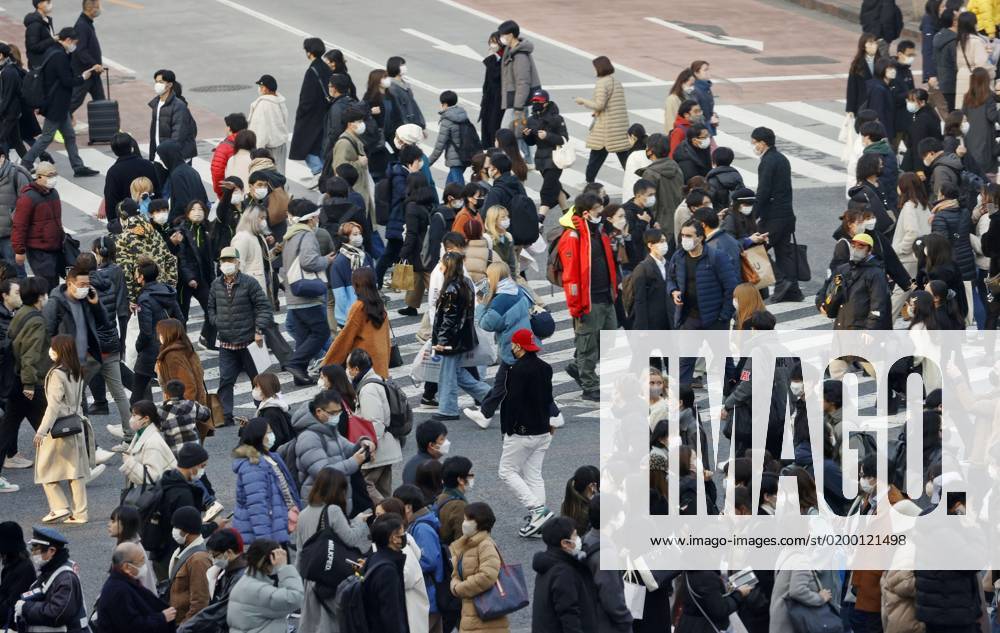 Tokyo scene amid coronavirus pandemic People wear face masks outdoors near Tokyo s Shibuya station on Jan. 20, 2023. Japanese Prime Minister Fumio Kishida announced same day plans to downgrade the legal status of COVID-19 to the equivalent of seasonal influenza in the spring. A14AA0001386701P