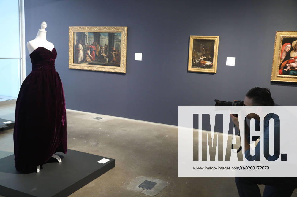 A photographer takes a photo of the historic Princess Diana dress by Victor Edelstein (Autumn 1989), seen on display for the first time in over 25 years at Sothebyâ€⠢s New York Masters Week ‘The Oneâ€⠢ auction. The purple strapless evening dress was worn in a royal portrait in 1991, and later appeared in Vanity Fair in 1997, shot by Mario Testino during a portrait session with Princess Diana in one of her most iconic and favorite dresses of all time. The dress is expected to sell for $80,000 - $120,000. New York City USA - ZUMAk03_ 20230120_zaf_k03_008