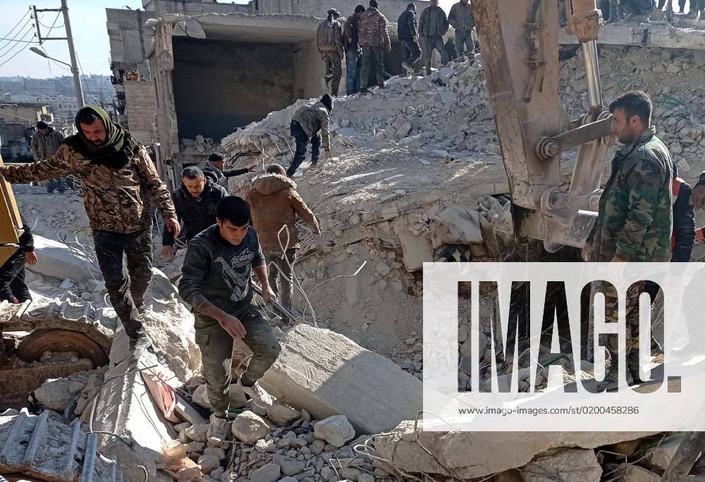 (230123) -- ALEPPO, Jan. 23, 2023 -- This photo taken with a mobile phone shows rescuers searching the rubble for survivors after a residential building collapsed in Aleppo city, Syria, Jan. 22, 2023. A total of 16 civilians were killed, and four others wounded on Sunday when their residential building collapsed in the northern Syrian province of Aleppo, state news agency SANA reported. The five-storey building, which the Interior Ministry said had housed seven families in the predominantly Kurdish neighborhood of Sheikh Maksoud, collapsed due to a water leakage affecting its basis. (Str Xinhua) SYRIA-ALEPPO-COLLAPSED BUILDING AmmarxSafarjalani