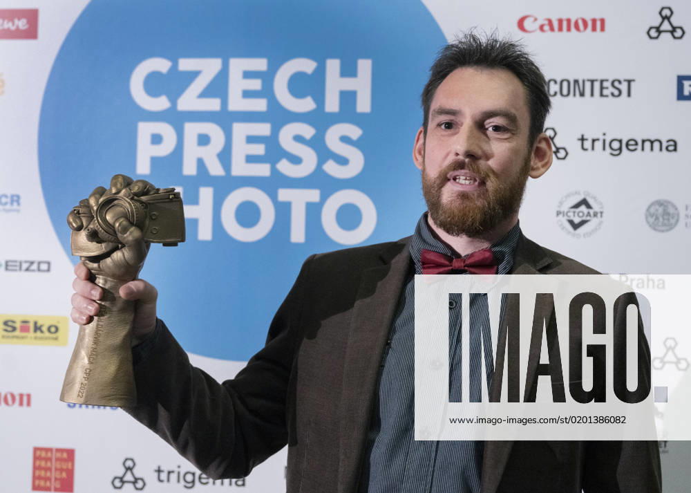 Czech photographer Vojtech Darvik Maca poses with the Czech Press Photo 2022 main prize, on January 31, 2023, in Prague, Czech Republic. Maca won with photo from the massacre in Bucha, Ukraine. (CTKxPhoto MichaelaxRihova) CTKPhotoP2023013108495 P2023013108495